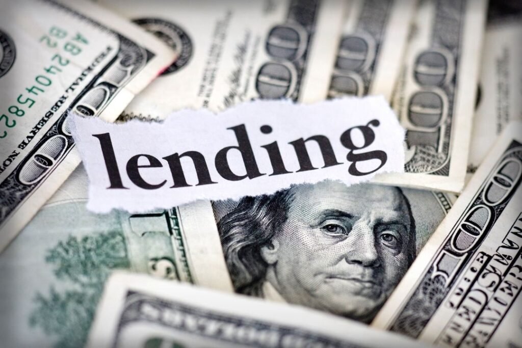 100 USD bills with the word lending
