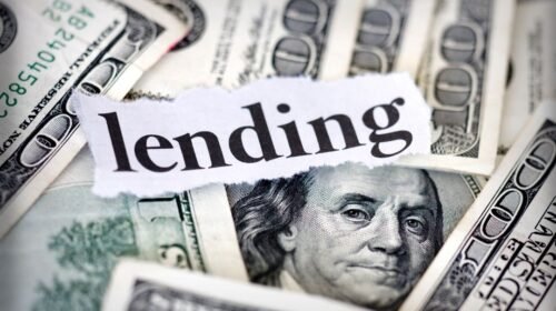 100 USD bills with the word lending