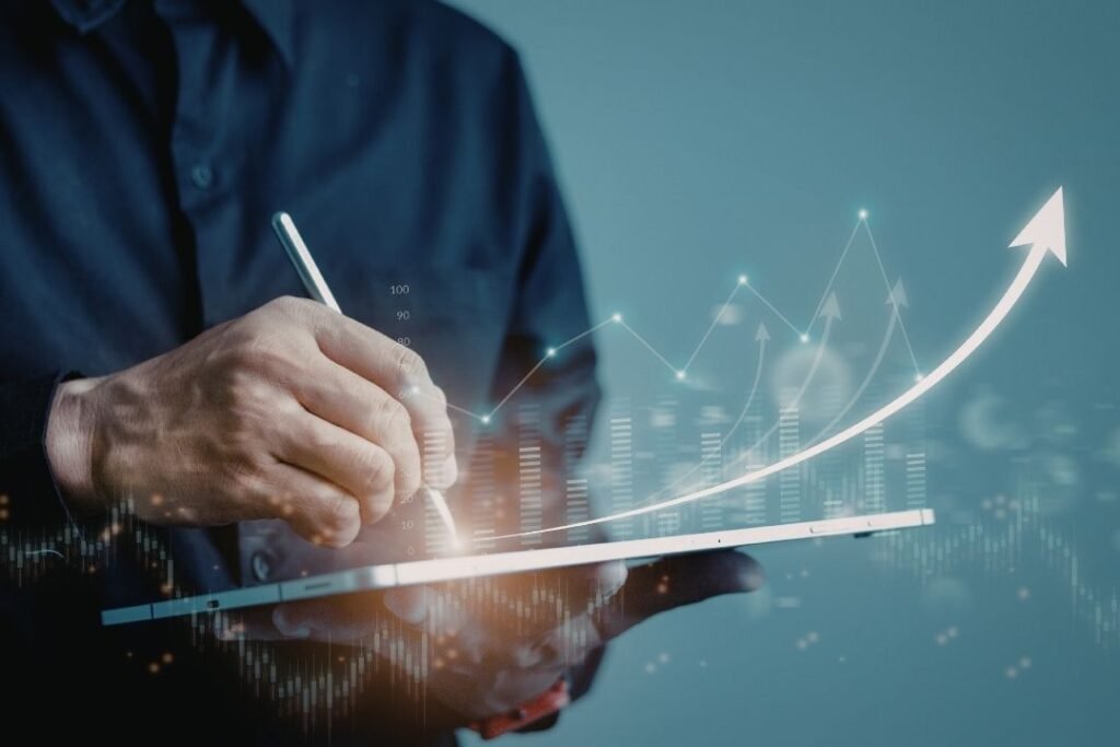 man viewing an investment portfolio on a screen